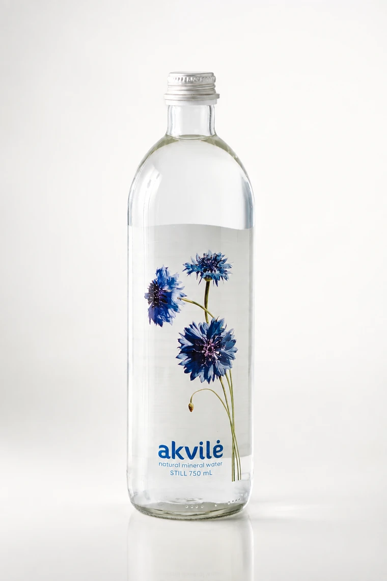 akvilė still natural mineral water 750 mL glass bottle with blue cornflower artwork